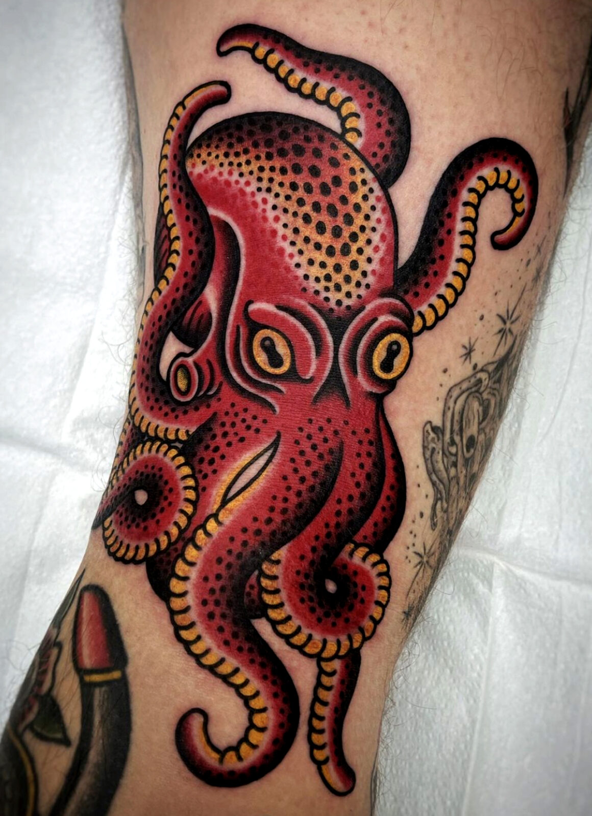 Neotraditional style octopus tattoo done on the chest.